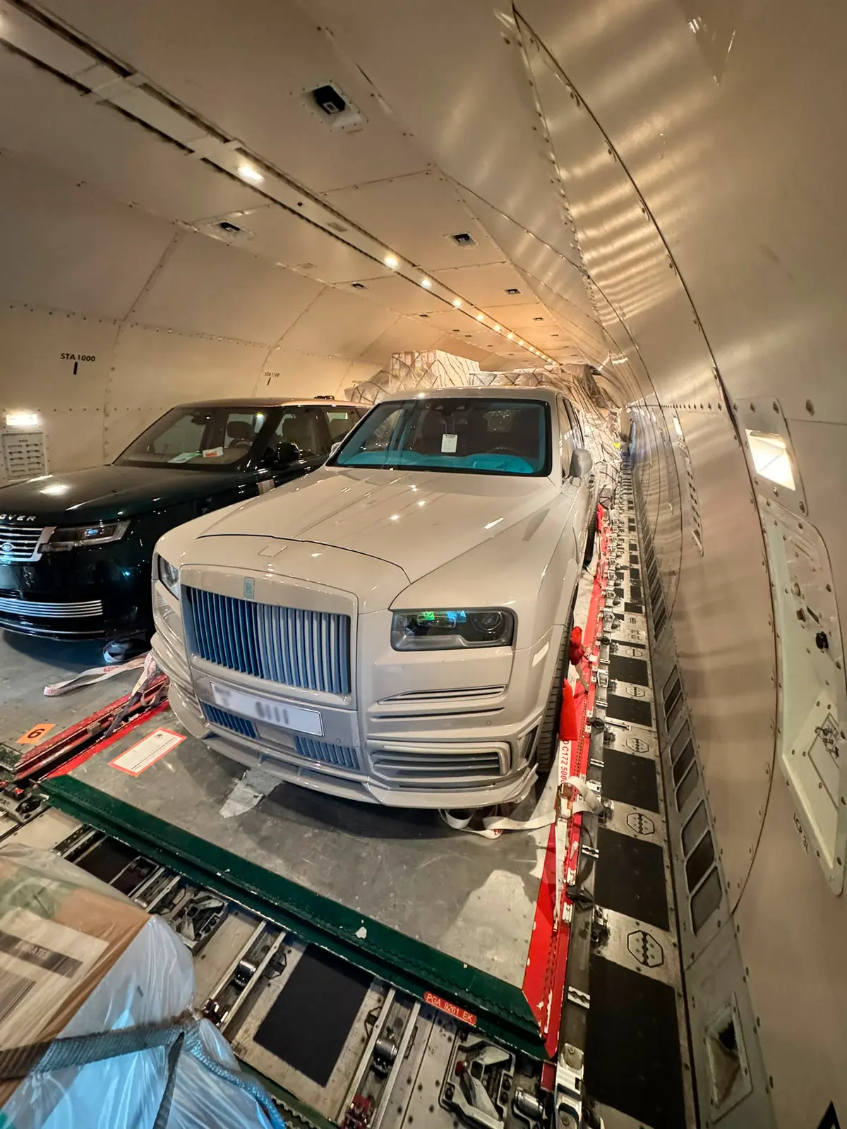 Cars secured on the main deck of a freighter aircraft