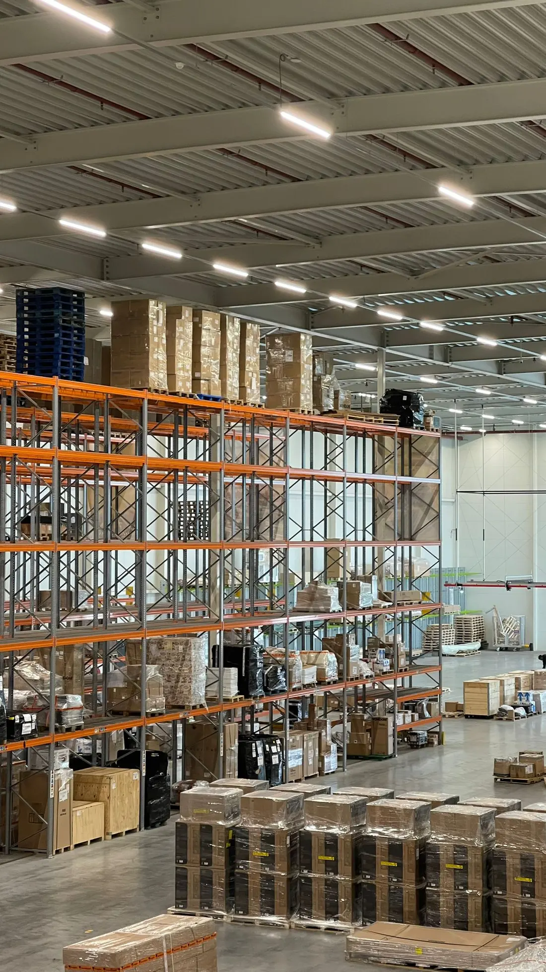 High-bay pallet racking filled with shipments